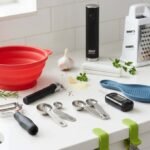 Assortment of useful kitchen gadgets under twenty five dollars on a counter