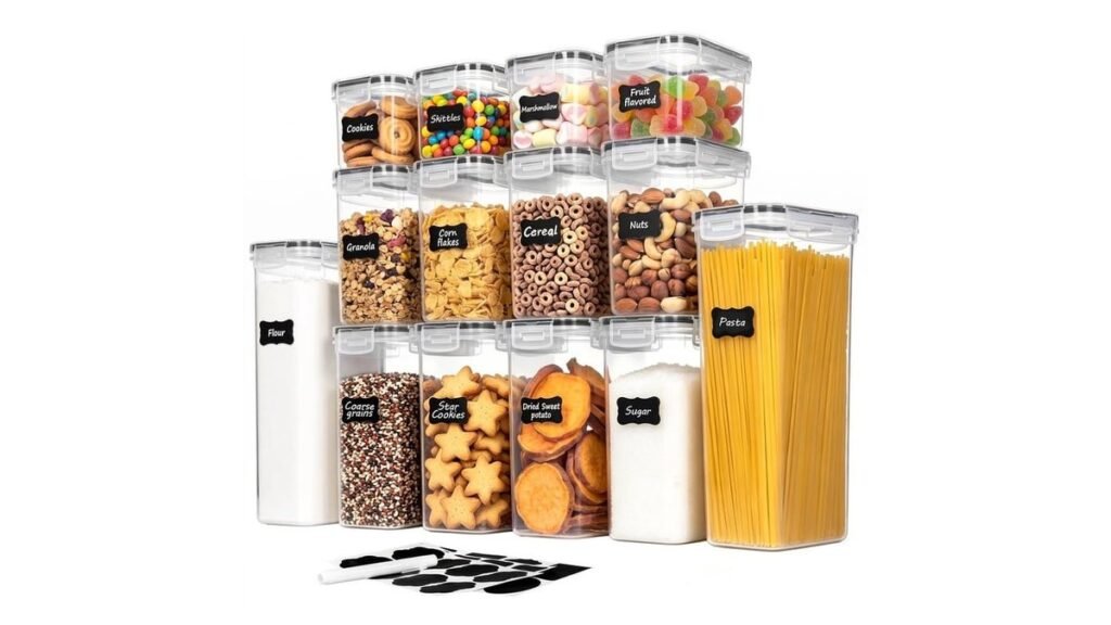 Glass airtight food storage containers organized on a clean pantry shelf