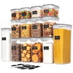 Glass airtight food storage containers organized on a clean pantry shelf