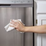 Shiny stainless steel kitchen appliances reflecting clean modern design