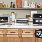 Sleek air fryer toaster oven on a white kitchen counter