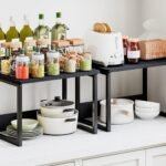 Stackable pantry organizers display efficient small apartment storage solutions